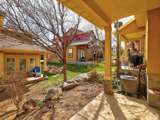 View of yard featuring a patio area and french doors | Image 32