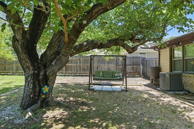 View of yard with a fenced backyard | Image 29
