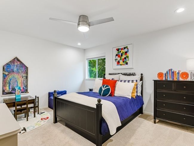 Carpeted bedroom featuring baseboards, recessed lighting, and a ceiling fan | Image 20