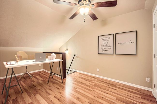Flex room with wood finished floors, lofted ceiling, baseboards, and ceiling fan | Image 19