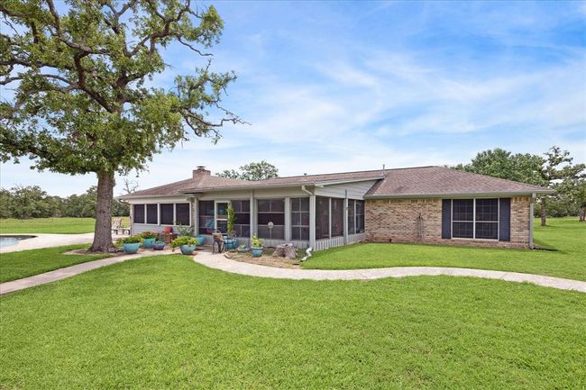 Back of the home and pool area | Image 4