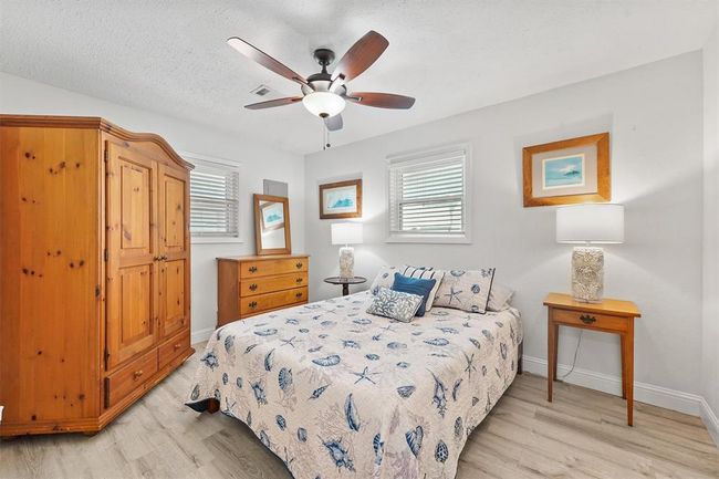 Light-filled secondary bedroom with clean finishes and a serene feel—perfect for guests, kids, or a personalized retreat. | Image 13