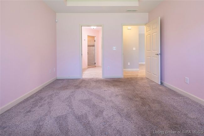 Main bedroom looking into bathroom & hallway | Image 62