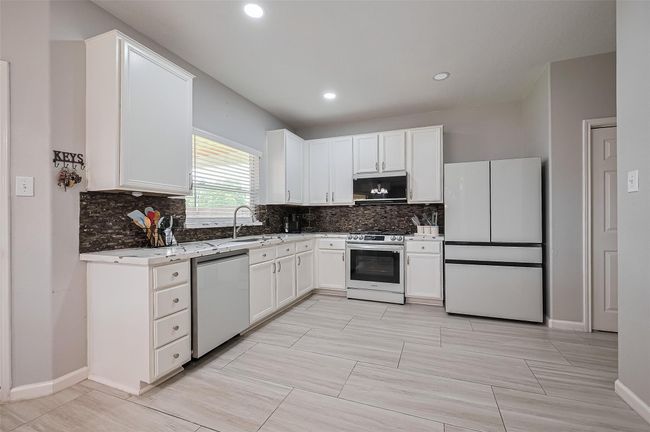 723 Pine Thicket Ct, House other with 3 bedrooms, 3 bathrooms and 2 parking in Spring TX | Image 12