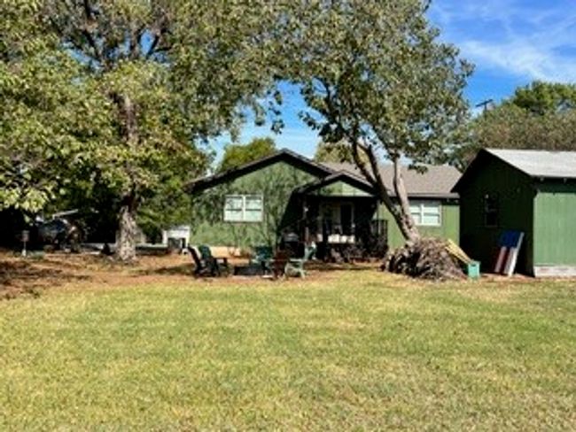 Rear view of property with a lawn | Image 25