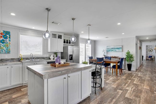 Kitchen sink features an Aquasana water filter | Image 11
