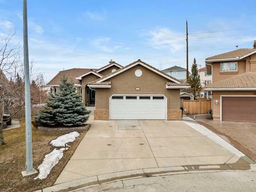 755 Hawkside Mews Nw, Home with 4 bedrooms, 3 bathrooms and 4 parking in Calgary AB | Card Image