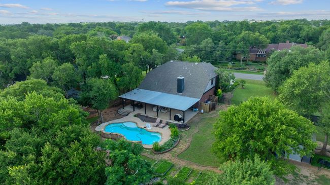 View from above of property with a pool | Image 38