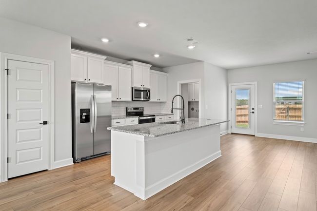 s you walk through the entry you will find yourself in the fully loaded kitchen, a culinary paradise that's ready to turn you into a gourmet chef. | Image 5