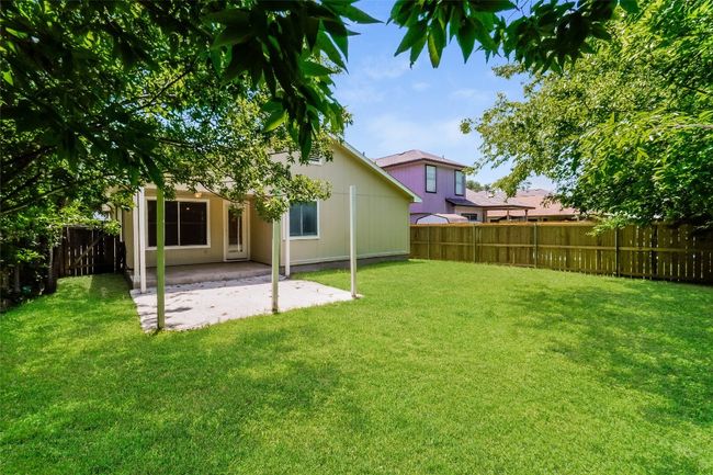 Rear view of property featuring a patio and a fenced backyard | Image 21