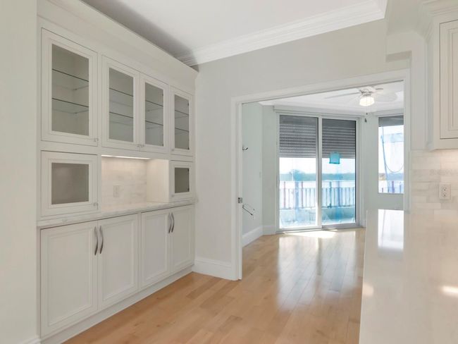 Kitchen w/Built-in Cabinets & Bar Area | Image 23