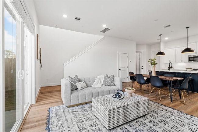 This well-designed floor plan seamlessly connects the living, dining, and kitchen areas, maximizing space and functionality. | Image 11