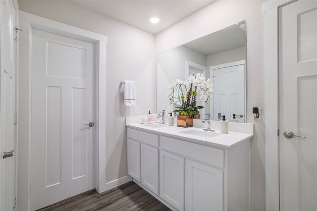 Bathroom with double vanity. | Image 18