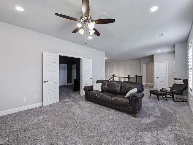 Open loft game room just next to the media room | Image 27