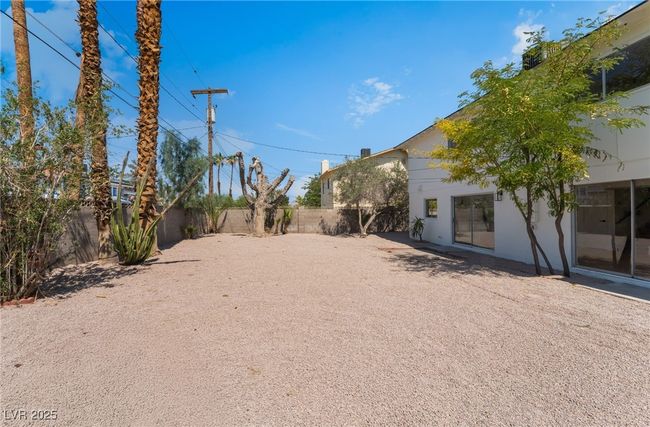 View of fenced backyard | Image 55