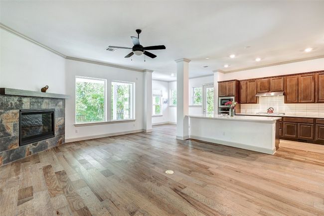 Open Living, Dining Kitchen and Fireplace | Image 6