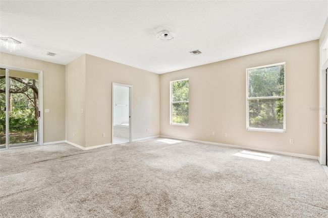 11933 Pasco Trails Blvd, House other with 4 bedrooms, 3 bathrooms and null parking in SPRING HILL FL | Image 17