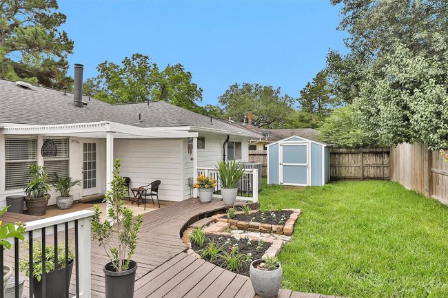 With plenty of room for gardening, play, or outdoor entertaining, it’s a true extension of the home’s living space. | Image 33