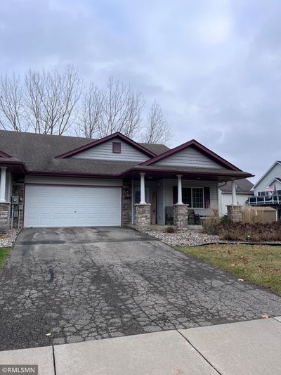 Are you looking for one level living? Look no further. Very inviting home with cozy front porch | Image 1