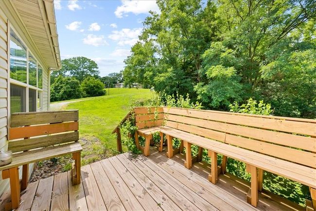 Deck featuring a yard | Image 25