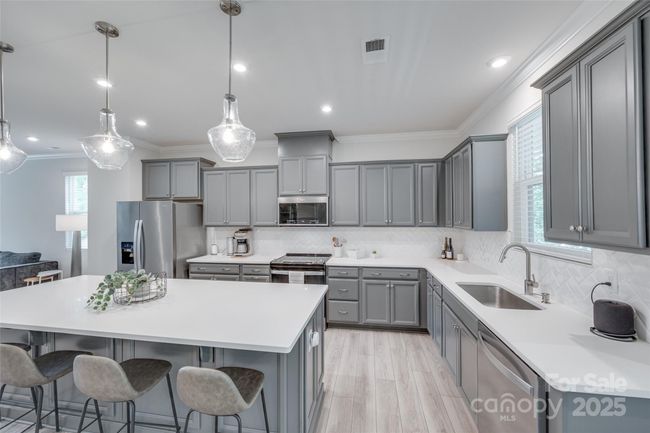 12024 John Newton Dr, Townhouse with 4 bedrooms, 4 bathrooms and null parking in Davidson NC | Image 12