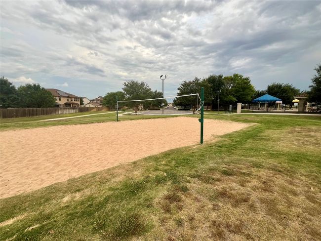 View of community with volleyball court | Image 34