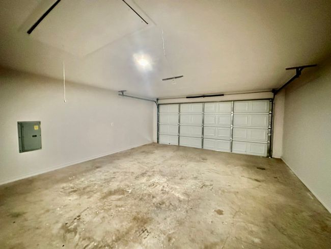 Garage with electric panel | Image 18