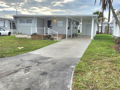 Home sweet Home! A lengthy driveway to store all your vehicles. Brand new shed, porch roof and carport | Image 1