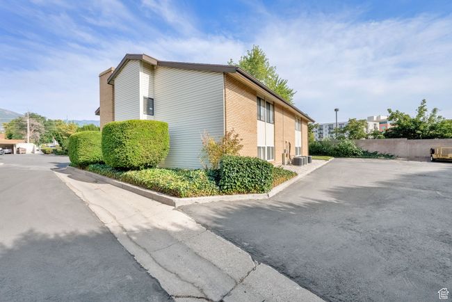View of home's exterior featuring brick siding | Image 14