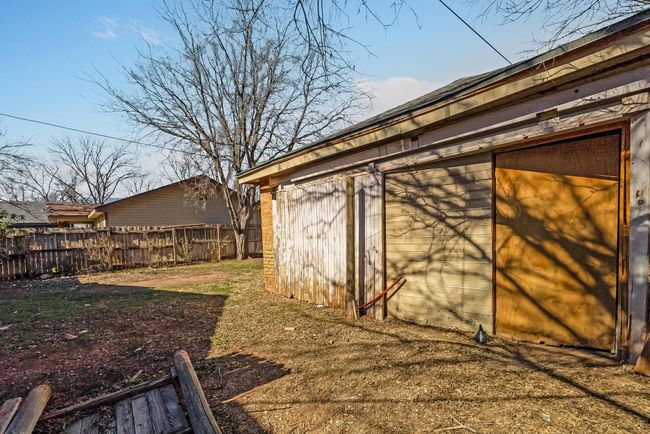 View of yard featuring an outdoor structure | Image 38