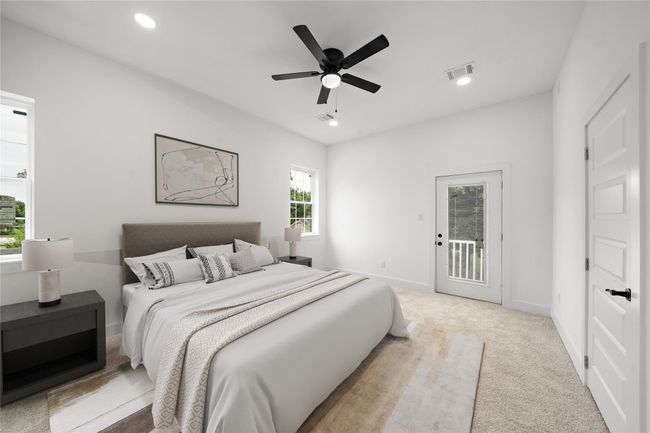 2nd Floor: Primary Bedroom with Private Balcony. (Virtually Staged) | Image 11