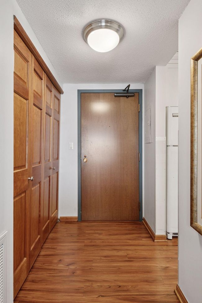 Entry hall with large coat closet | Image 23