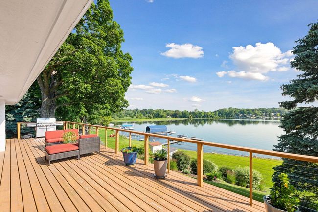 The deck is 43 feet long providing a huge extension of the summertime living space! | Image 32
