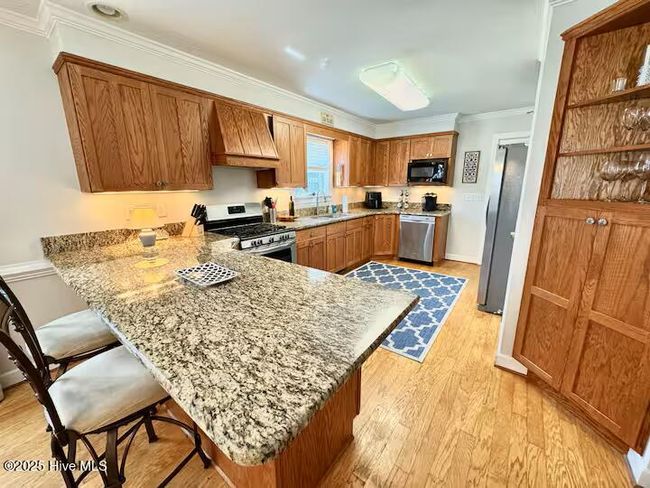 111 Ne 39 Th St, House other with 3 bedrooms, 2 bathrooms and 2 parking in Oak Island NC | Image 12