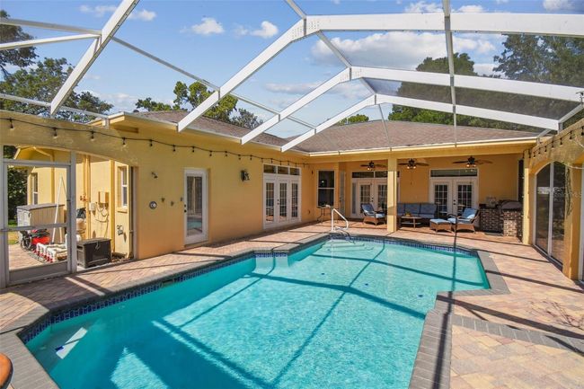 18502 Winding Oaks Blvd, House other with 4 bedrooms, 3 bathrooms and null parking in Hudson FL | Image 7