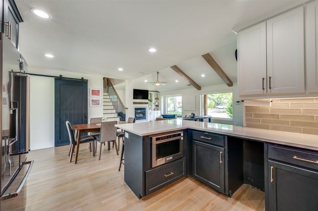 Kitchen opens to living and dining! | Image 16
