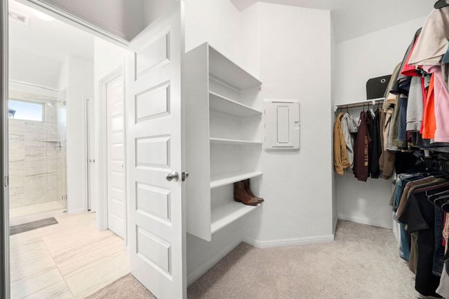 Walk in closet with electric panel | Image 24