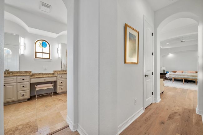 Hallway with an office area | Image 17