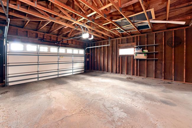 Garage has Direct Entrance to Home, Service Door to Yard and Insulated Main Garage Door! | Image 32