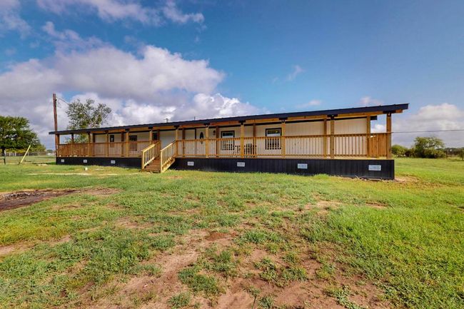Back of property with a lawn | Image 33