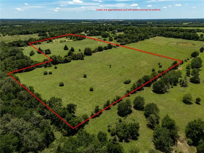 Aerial view of sparsely populated area with property boundaries highlighted | Image 34