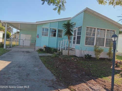 720 Lark Dr, Barefoot Bay, FL, 32976-7224 | Card Image