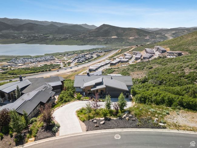 View of mountain background featuring a nearby body of water | Image 9