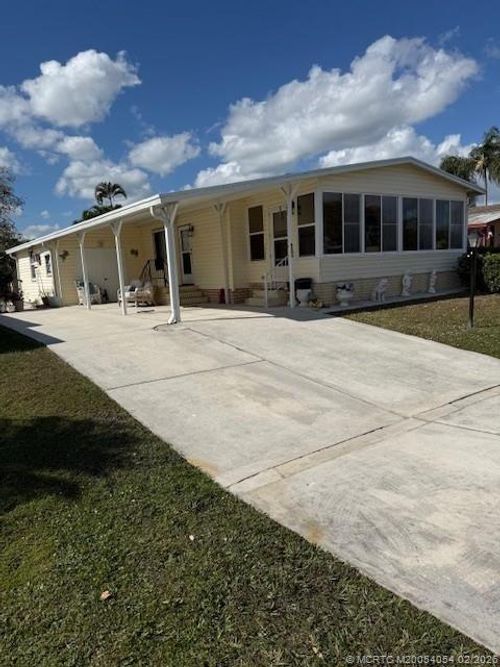 8203 E Bitterbush Ln, Port St Lucie, FL, 34952-3316 | Card Image