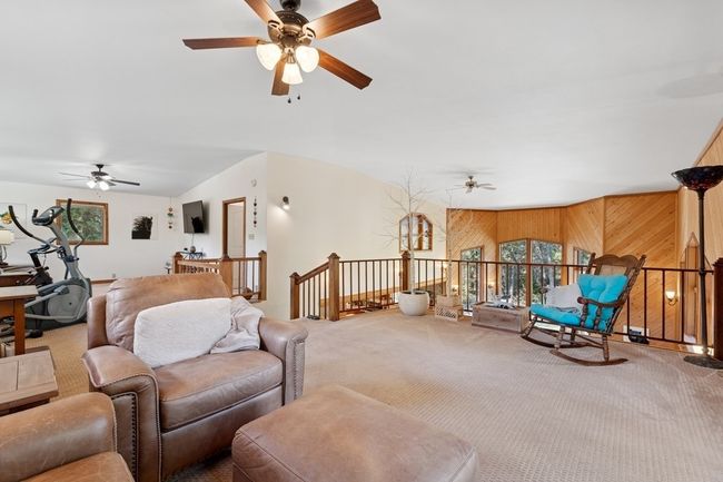Upper level living room in the loft area. | Image 58