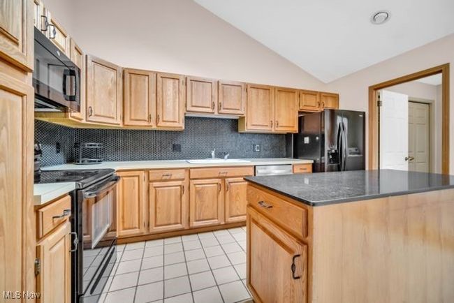 Note the doorway in back right of picture which leads to utility/mudroom off garage | Image 17