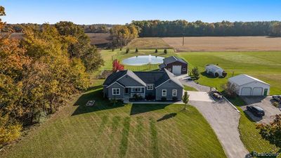 7898 Hough Road, Home with 4 bedrooms, 2 bathrooms and null parking in Almont Twp MI | Image 1