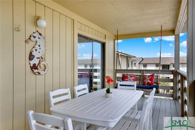 Spacious Balcony with Swing & Storage Closet with View of Pool, Lighthouse & Ocean | Image 33