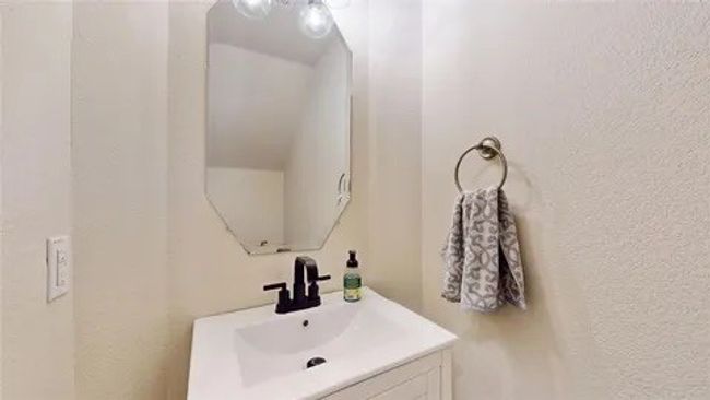 Bathroom featuring vanity | Image 7