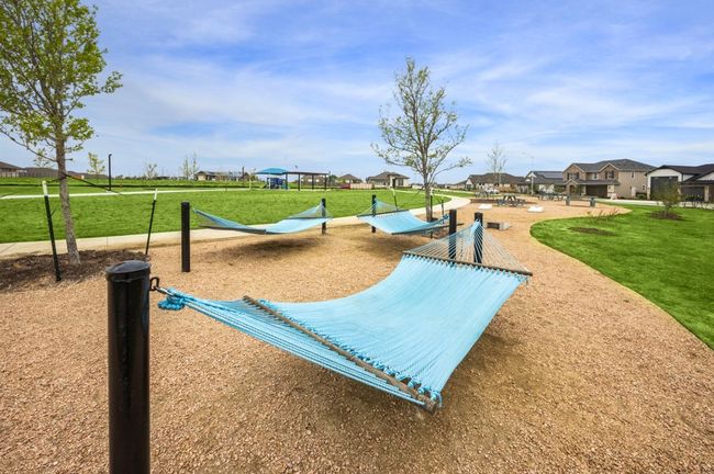 View of property's community featuring a yard and a residential view | Image 28